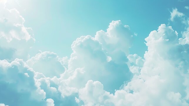 A dreamy pastel blue cloudy background with soft white clouds floating seamlessly.