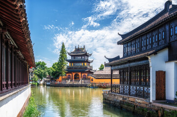 Naklejka premium China traditional tourist boats at Shanghai Zhujiajiao town with boat and historic buildings, Shanghai China
