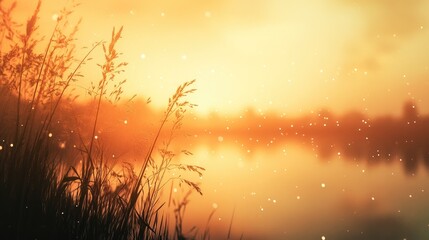 Serene blurred nature background with soft golden hues and subtle reflections creating a peaceful atmosphere by the water's edge.