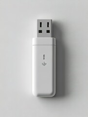 White USB cable is hanging from a wall