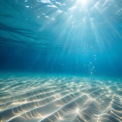 Obraz premium The water is clear and the sun is shining on it. There are bubbles in the water