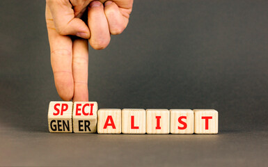 Specialist or globalist symbol. Concept words Specialist Globalist on beautiful wooden blocks. Beautiful grey background. Doctor hand. Business specialist or globalist concept. Copy space