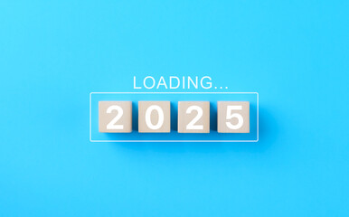 Loading 2025 New Year progress concept. Wooden blocks 