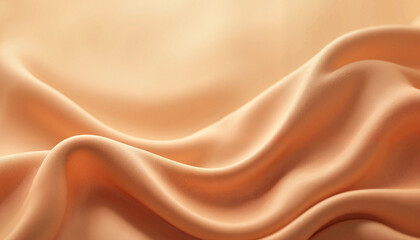 Obraz premium Smooth flowing peach-colored fabric with soft folds and texture