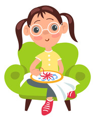 A girl is sitting on a green chair and sewing