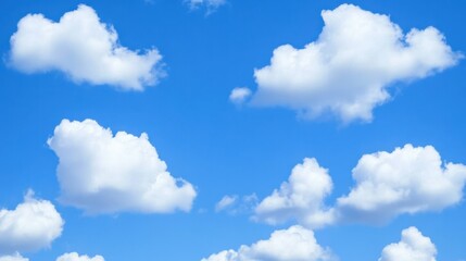 Fototapeta premium Bright Blue Sky with Fluffy White Clouds on a Clear Day