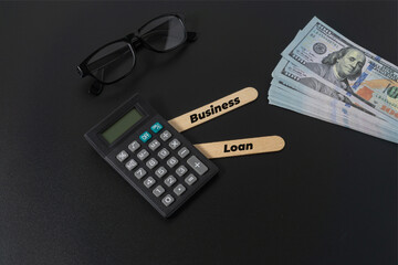 Business concept with a text Business Plan on black background