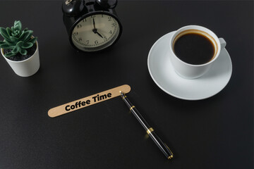 A cup of coffee with a text Coffee Time on black background