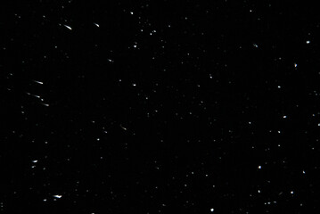 Sparkling snow snowdrifts close-up, perfect as a winter season white background or texture on black background