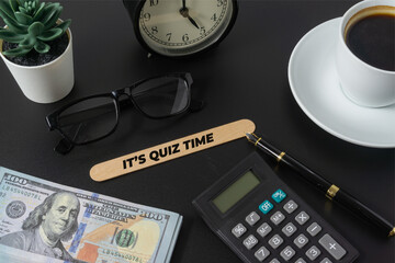 Business concept with a text Its Quiz Time on black background