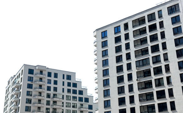 Modern apartment building. Contemporary high-rise residential architecture with balconies and windows. New housing complex for real estate development isolated on white background..