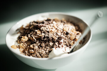 cup of oatmeal with spoon