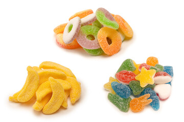 Assorted gummy candies isolated on a white background. Top view.