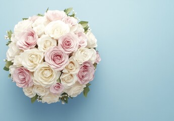 A creatively illustrated flat lay featuring fresh, vibrant spring flowers on a soft pastel blue background. The image highlights stunning pink blooms, perfect for stock photography.