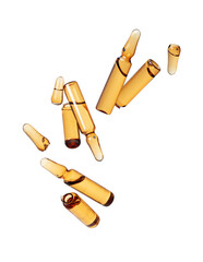 Levitation of broken ampoules in the air on a white background