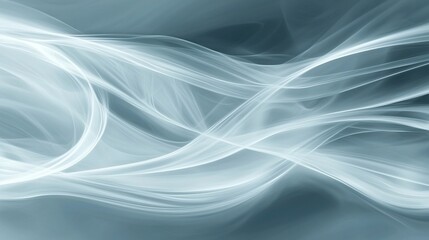 Obraz premium Abstract swirling light grey and white waves on a dark grey background.
