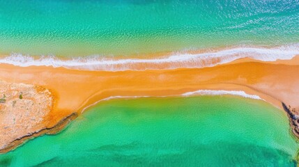 Obraz premium Serene Aerial View of Tropical Beach with Vibrant Turquoise Water and Sand