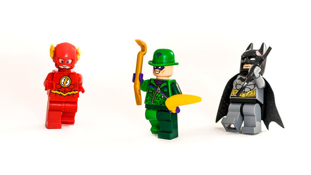 Lego toys Batman, Riddler and Flash from DC universe. Studio shot on white background.
