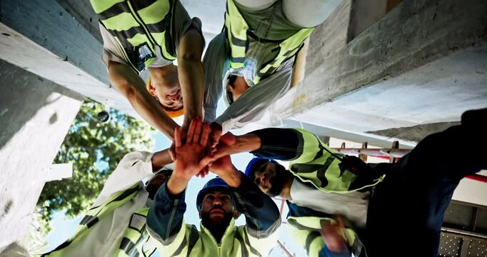 Architects, meeting and hands together with motivation, planning and diversity with safety. Below engineers, teamwork and construction site for collaboration, development and building maintenance