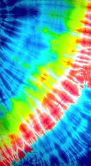 Tie dye is a bright rainbow colored pattern on a blue background