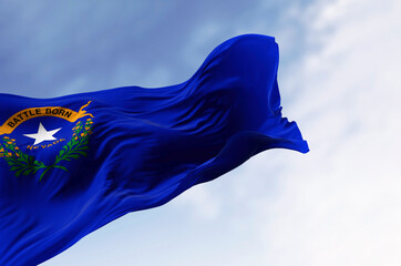 Nevada state flag waving in the wind on a clear day