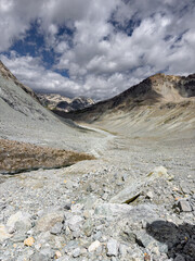 Walkers on the hiking trail by Riffelsee lake with the Matterhorn in the background. Zermatt, Switzerland. Europe
