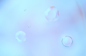 Minimalistic Blue Water Bubbles on Soft Gradient Background. Copy space
