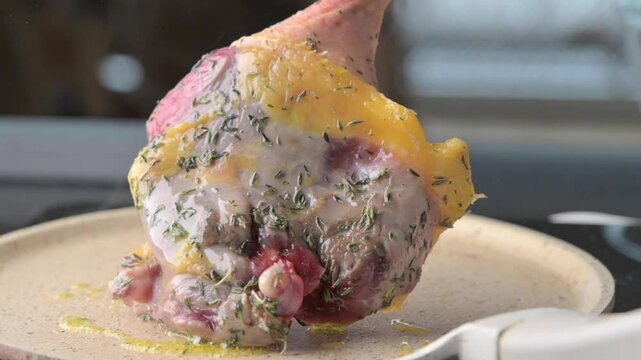 Roasted Duck Leg with Herbs and White Wine Gourmet Dining Experience. Succulent roasted duck leg seasoned with fresh herbs and paired with potatoes, served alongside a glass of white wine. 