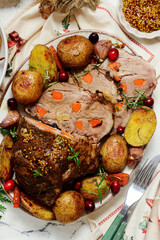 Baked pork neck with vegetbles..style rustic.top veiw