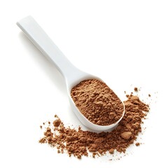 Cocoa Powder in a White Spoon on White Background