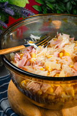 Festive ham salad with pineapple.