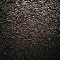 A close-up of an abundant black coffee bean texture, creating a rich, flavorful aesthetic.