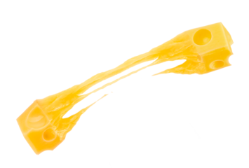 two pieces cheese cubes with holes melted cheese levitating in air isolated on white background