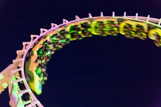 Wildwood, New Jersey, USA. Slow motion shot of roller coaster doing a loop. 
