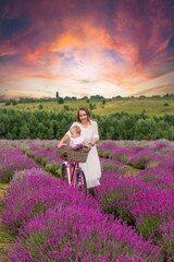 Happy mother and daughter in a lavender field