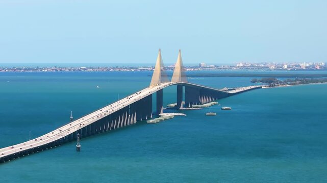 Aerial view of Sunshine Skyway Bridge over Tampa Bay in Florida with moving traffic. Concept of transportation infrastructure