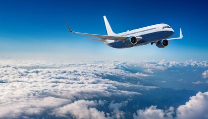 a commercial airplane soars high above clouds against a backdrop of a bright blue sky and open...