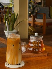 Iced coffee and tea on a wooden table