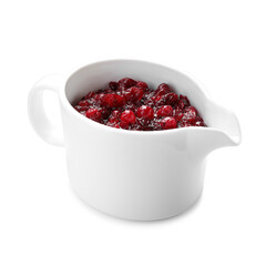 Tasty cranberry sauce in gravy boat isolated on white