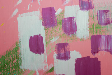 Color splashes on a pink wall texture and abstraction for interior and banner