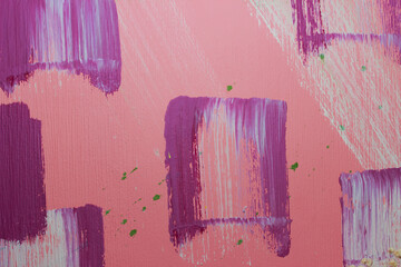 Color splashes on a pink wall texture and abstraction for interior and banner
