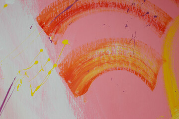 Color splashes on a pink wall texture and abstraction for interior and banner