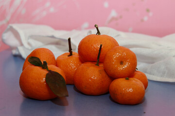 delicious sweet orange tangerines on the table before Christmas