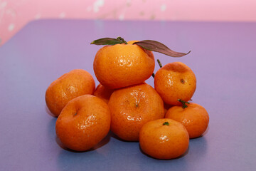 delicious sweet orange tangerines on the table before Christmas