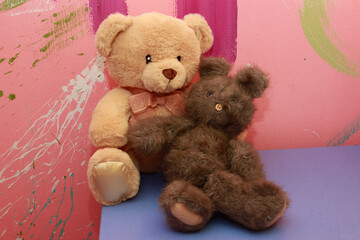 Beautiful teddy bears on a blue table