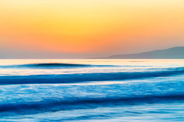 Obraz premium Sunset over ocean, sea, at sunrise