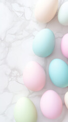 Fototapeta premium Soft-hued eggs in shades of blue, pink, and green adorn a smooth marble backdrop, celebrating the arrival of spring