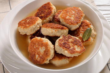 turkey potato cakes in white bowl, top view