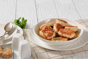 turkey potato cakes in white bowl, top view