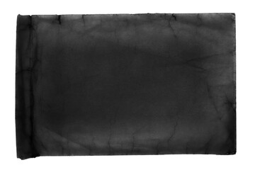 Old black paper envelope showcasing wear and texture with subtle creases and faded areas.